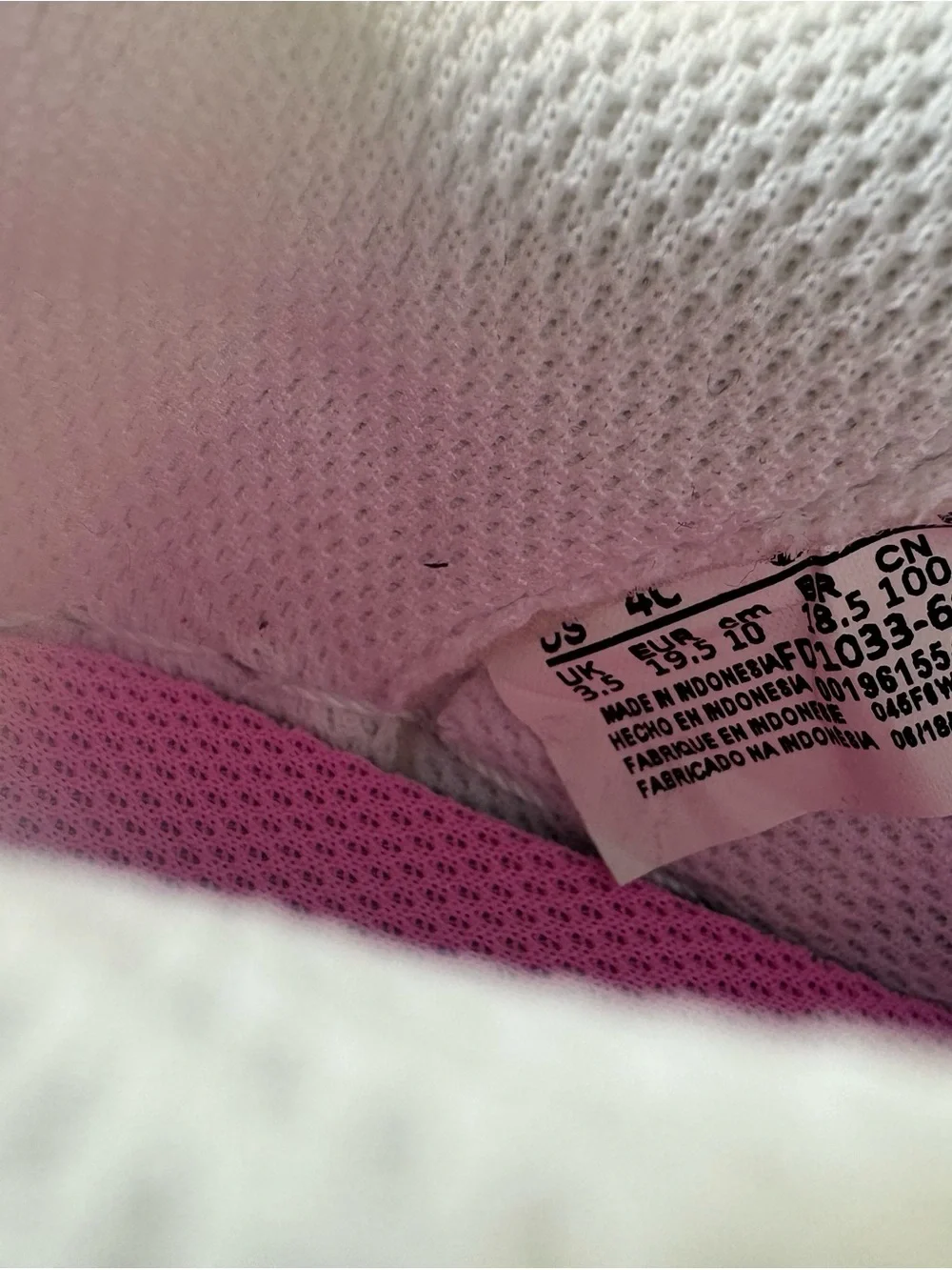Nike Kids White Sneakers with Pink Swoosh and Orange Panels
